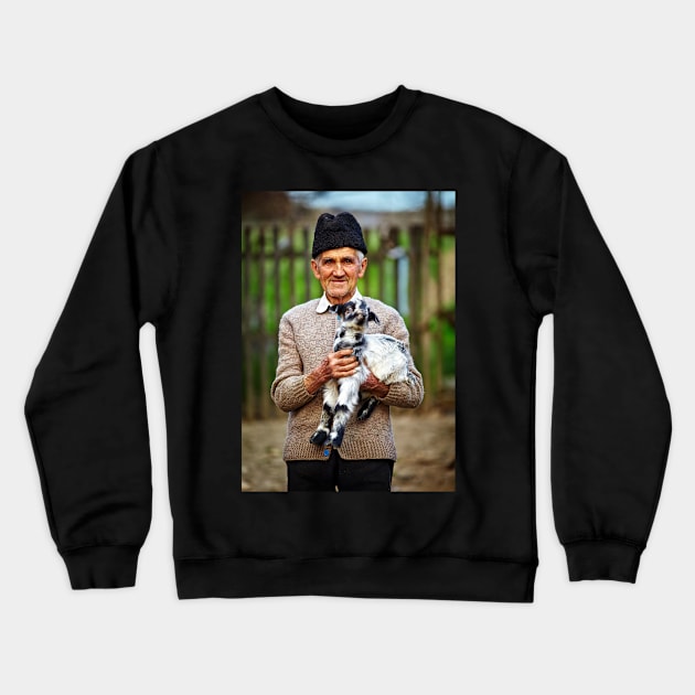 Old farmer with a baby goat Crewneck Sweatshirt by naturalis